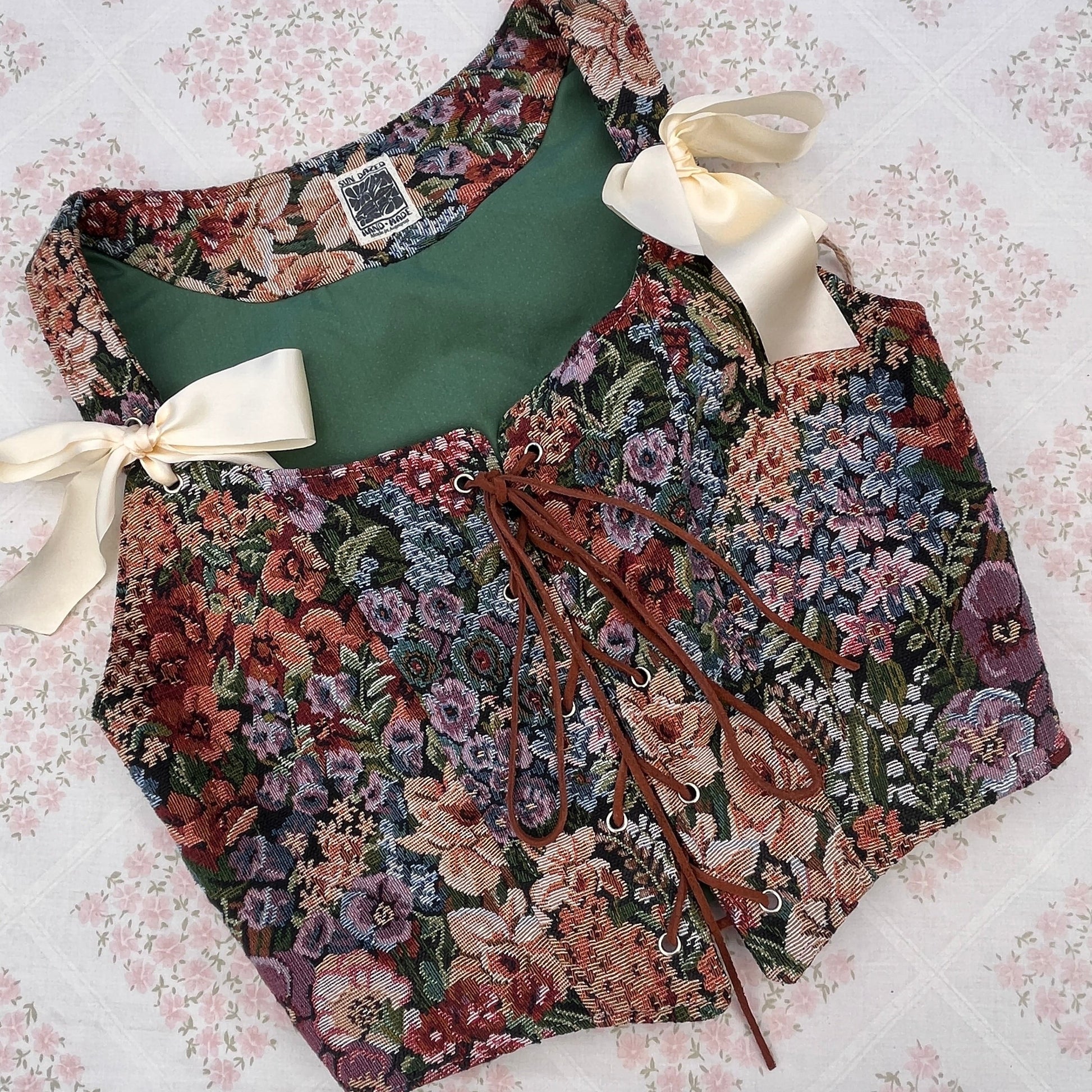 Floral-patterned corset with ribbons